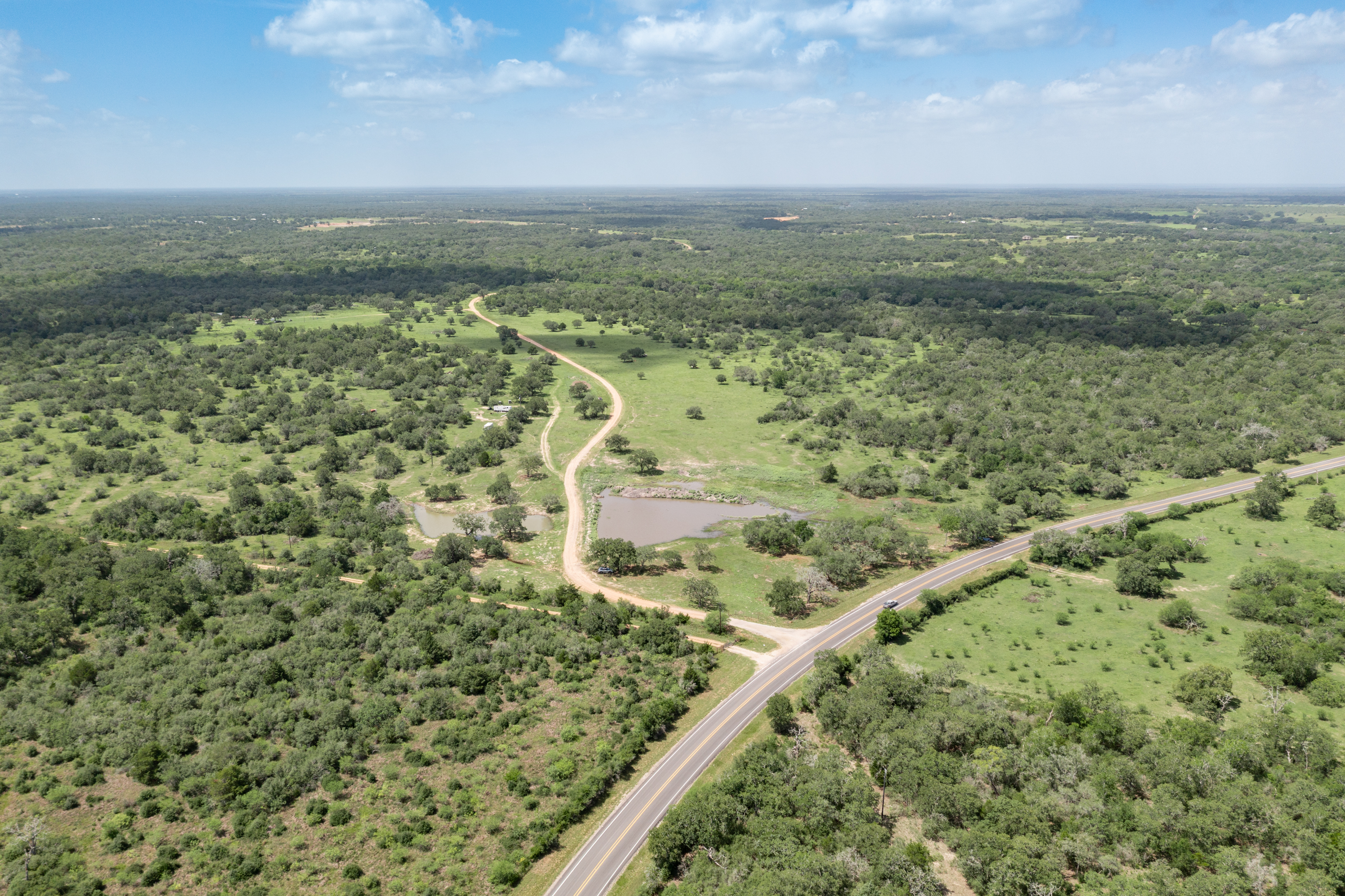 54.68 Cattle Guard Road Cuero, TX 77954 - Photo 51 of 67 a view of a lake with a city