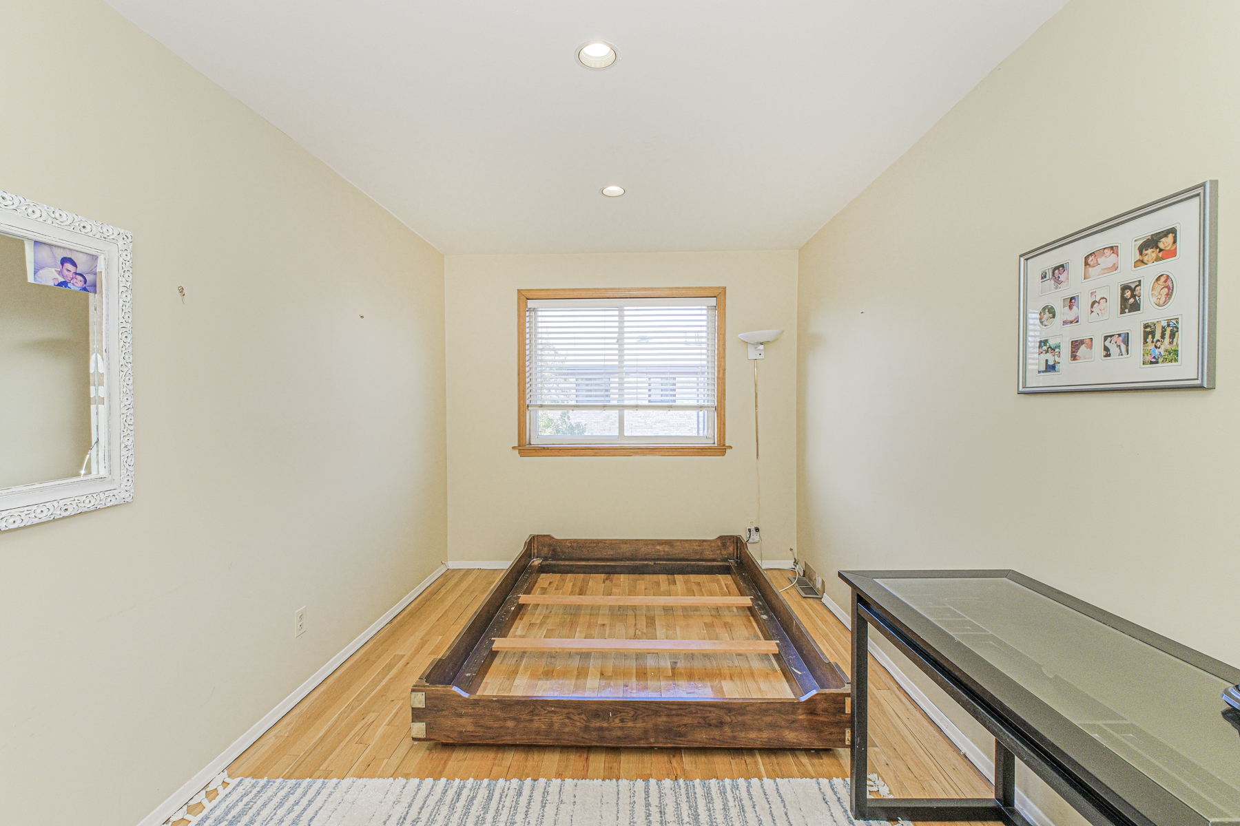97 Dogwood Lane Staten Island, NY 10305 - Photo 12 of 22 a view of a bedroom with wooden floor and window