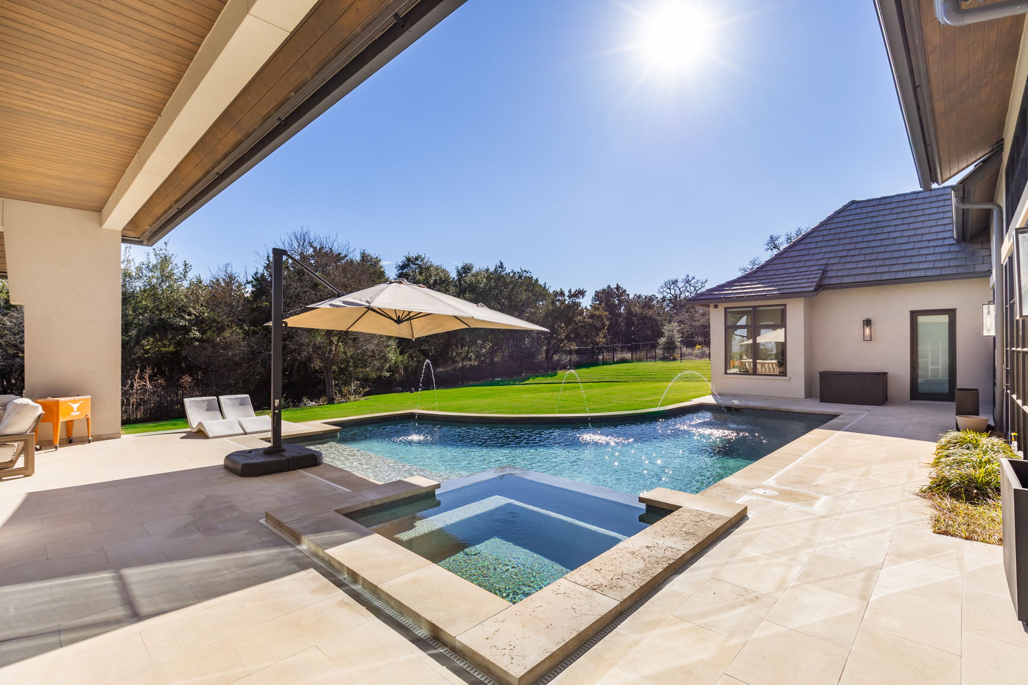 522 Delayne Drive Austin, TX 78737 - Photo 3 of 23 a view of a backyard with swimming pool