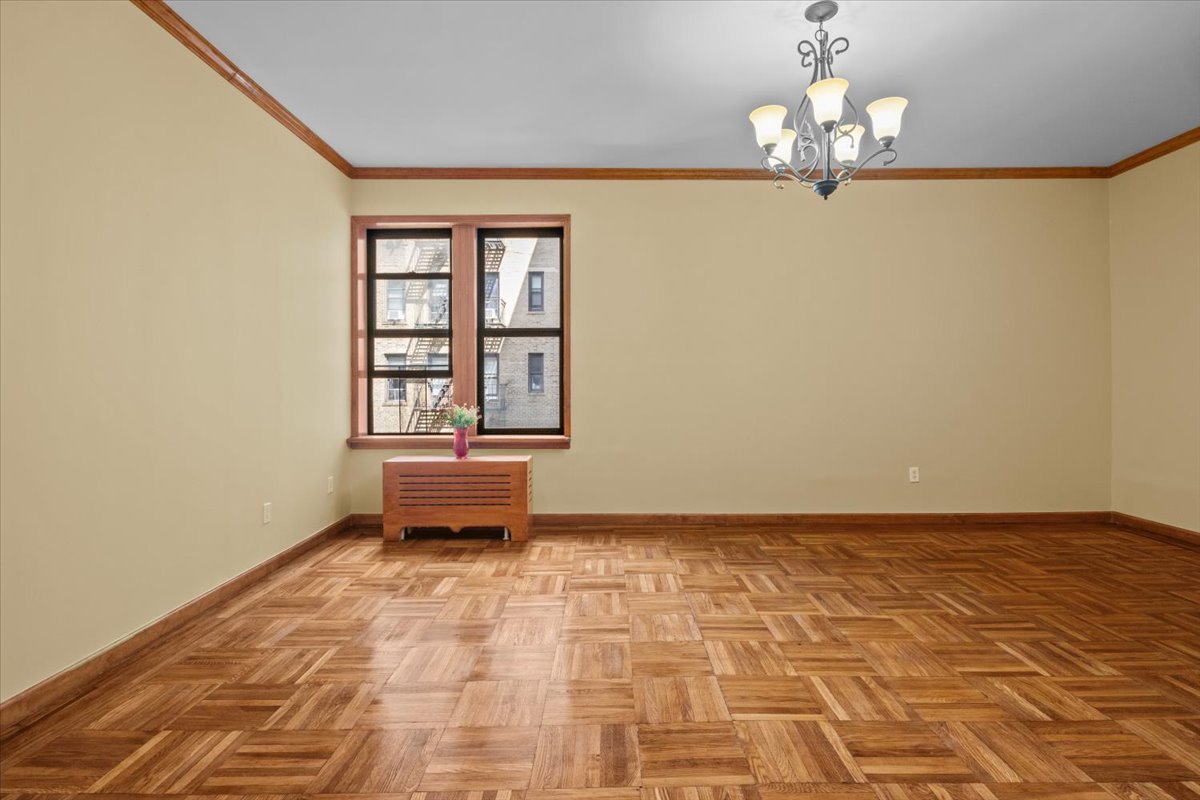 7101 Colonial Road, Unit R3E Brooklyn, NY 11209 - Photo 4 of 19 a view of an empty room with a window
