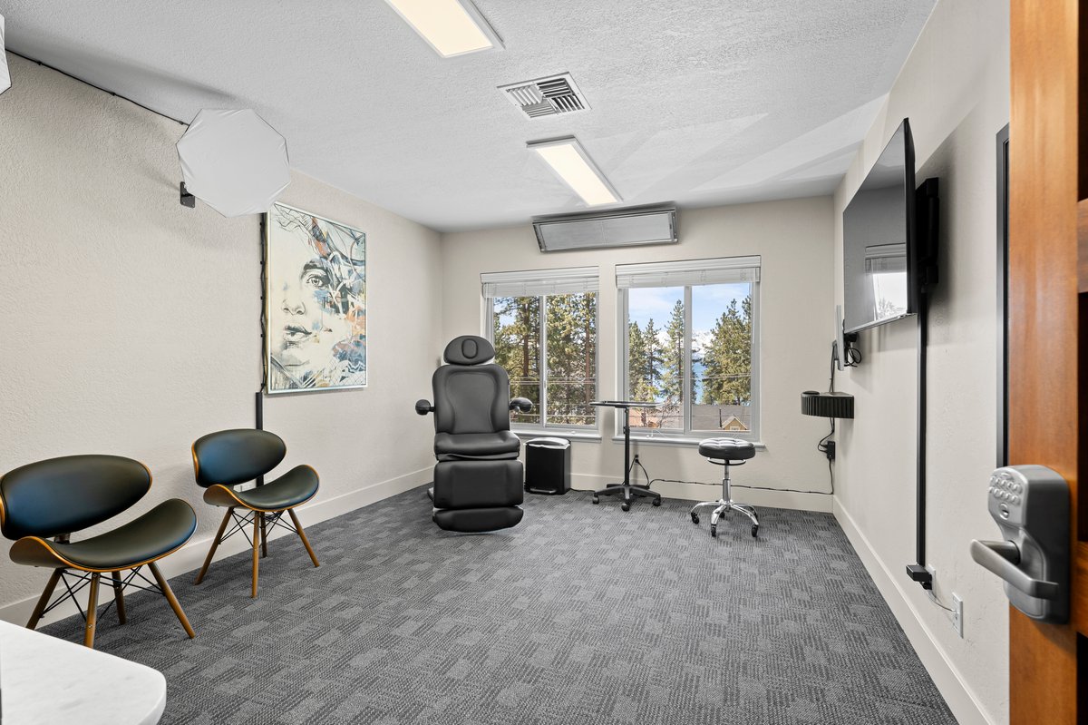 625 Highway 50 Zephyr Cove, NV 89448 - Photo 23 of 38 a living room with furniture and a large window