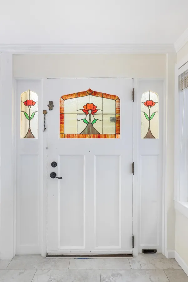 wooden floor with windows and painted walls