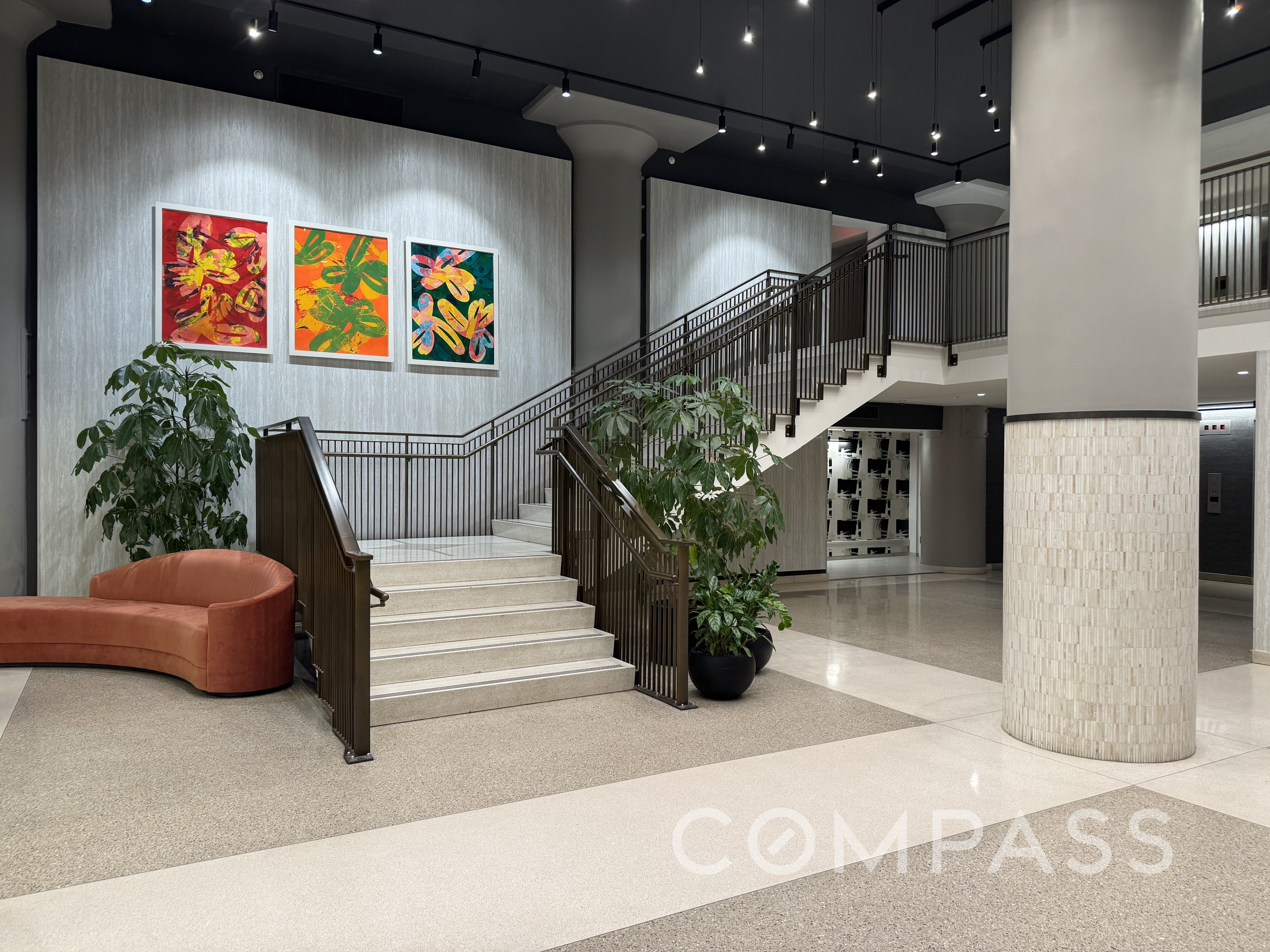 360 Furman Street, Unit 1041/1042 Brooklyn, NY 11201 - Photo 19 of 30 a lobby with furniture and potted plants