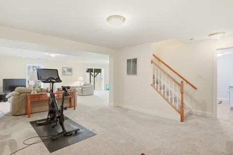 a bedroom with furniture and a couch