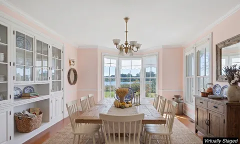 a bedroom with bed and wooden floor