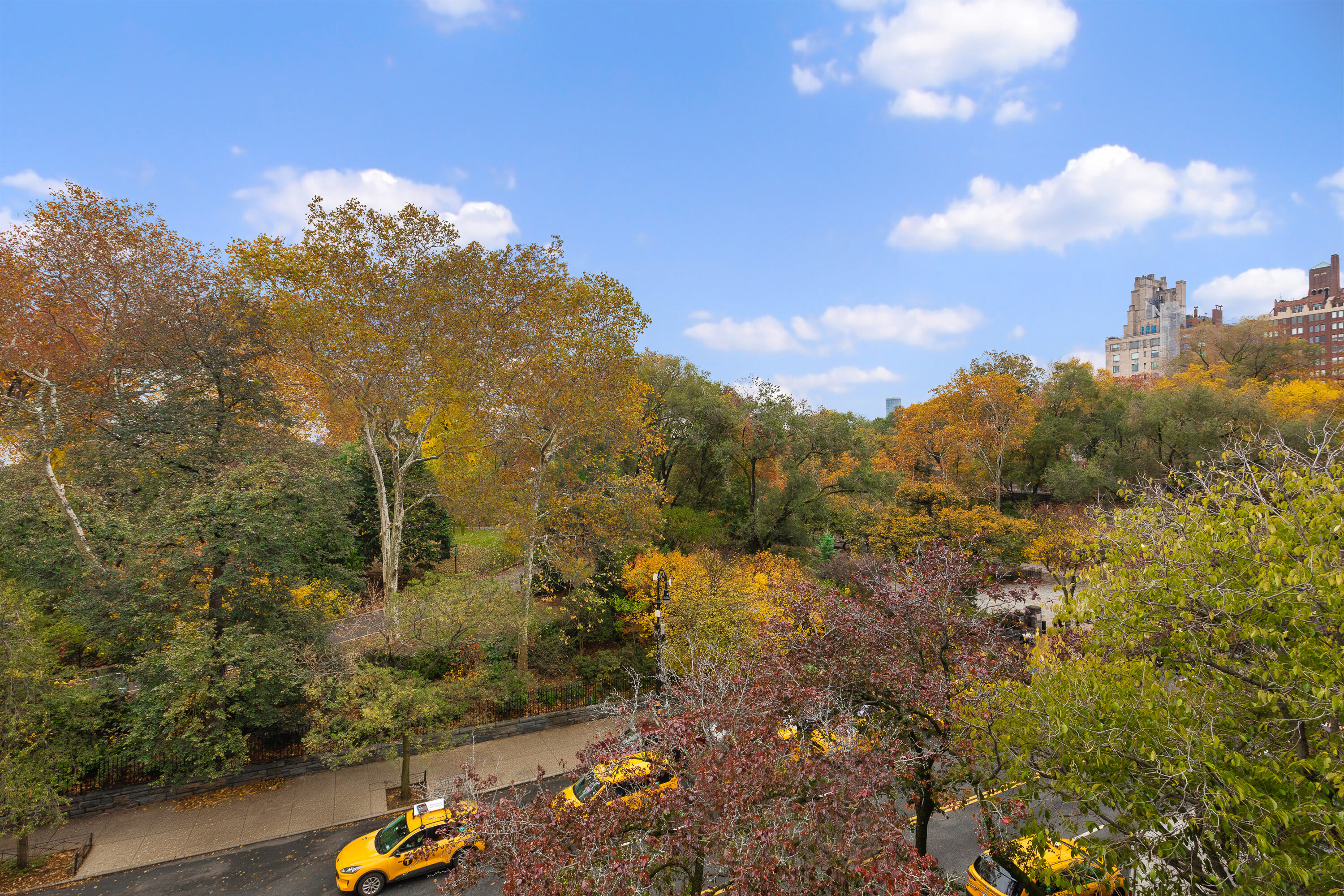 152 East End Avenue Manhattan, NY 10028 - Photo 14 of 15 a view of a town with mountains in the background