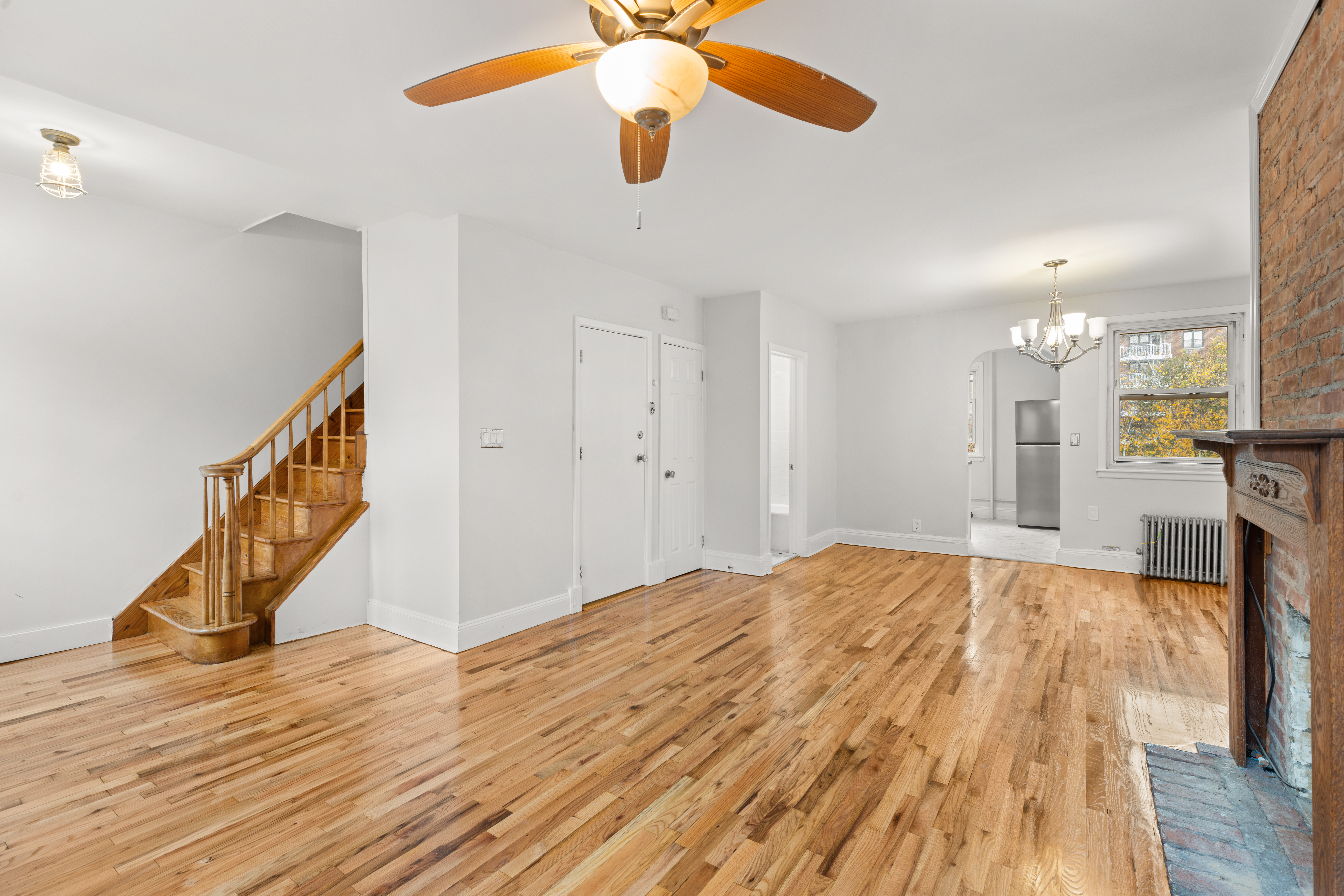 180 East 5th Street, Unit 2 Brooklyn, NY 11218 - Photo 4 of 14 a view of empty room with wooden floor