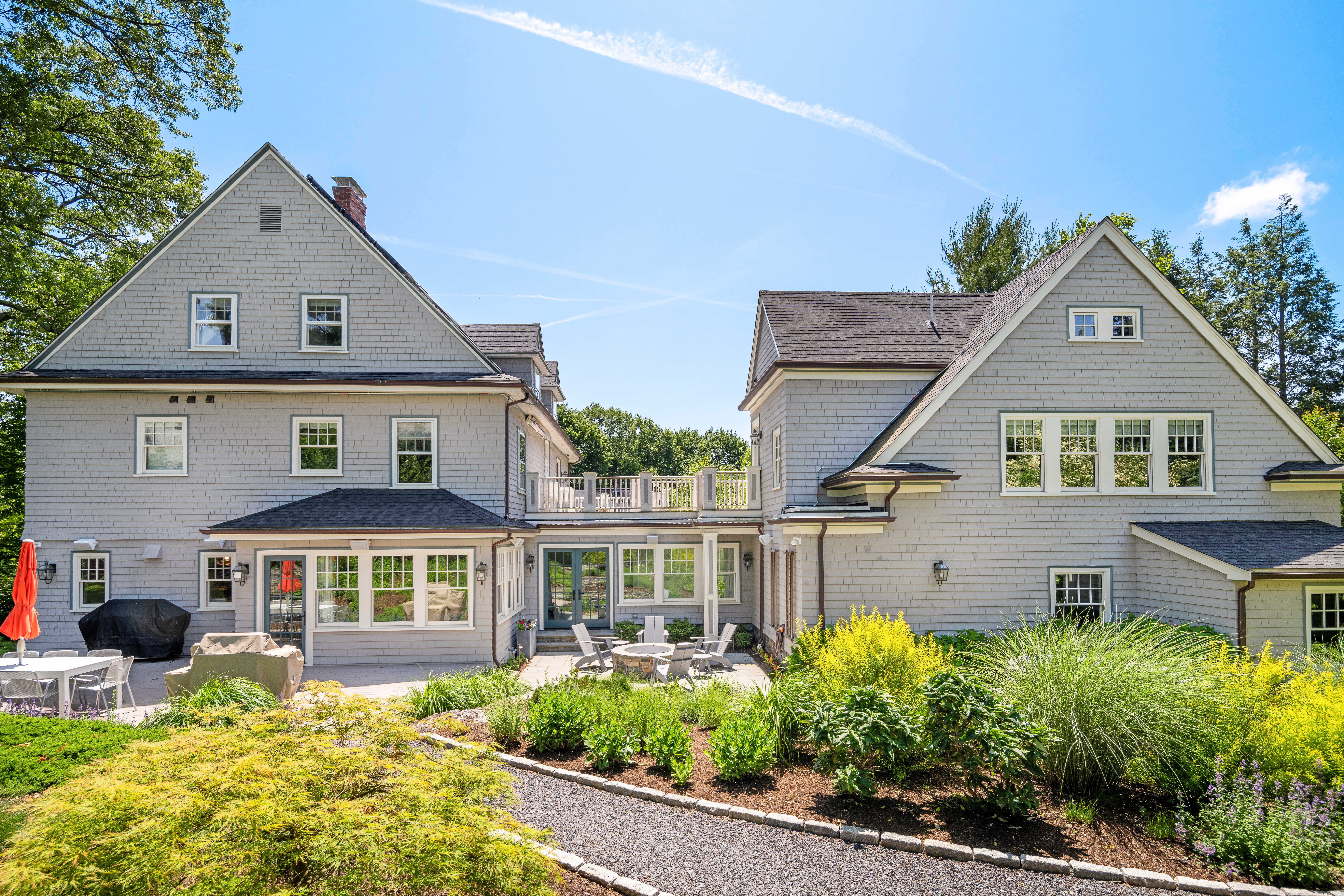 161 Pine Ridge Road Waban, MA 02468 - Photo 2 of 8 a front view of a house with a yard