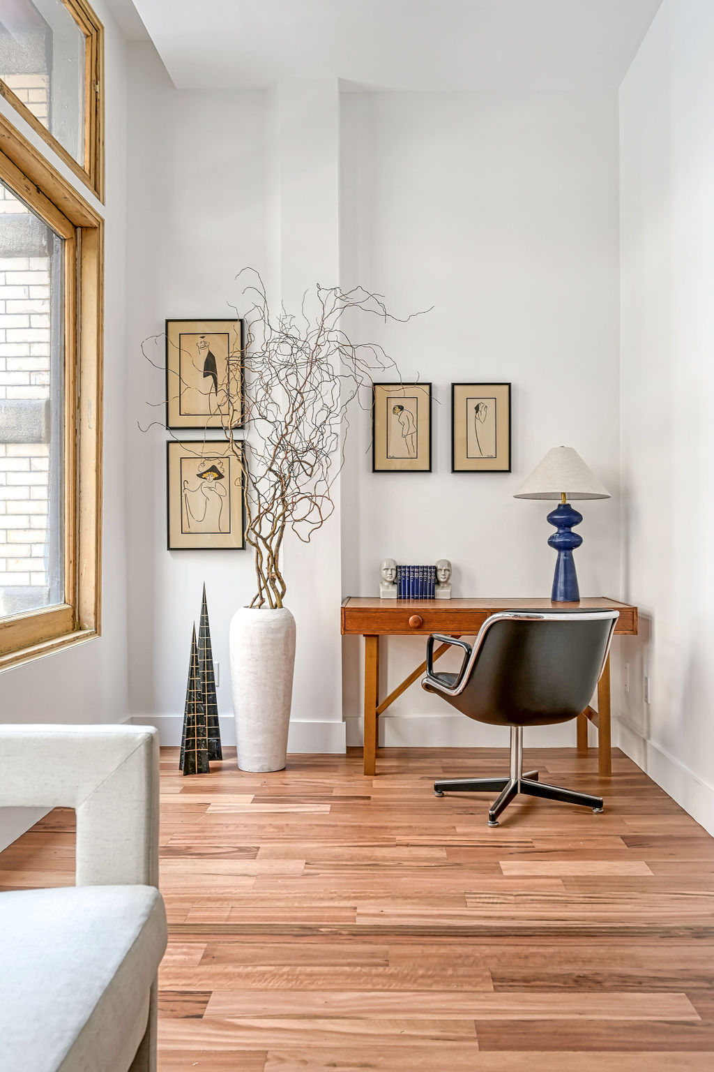 42 East 12th Street, Unit 2 Manhattan, NY 10003 - Photo 14 of 18 a living room with furniture and a table