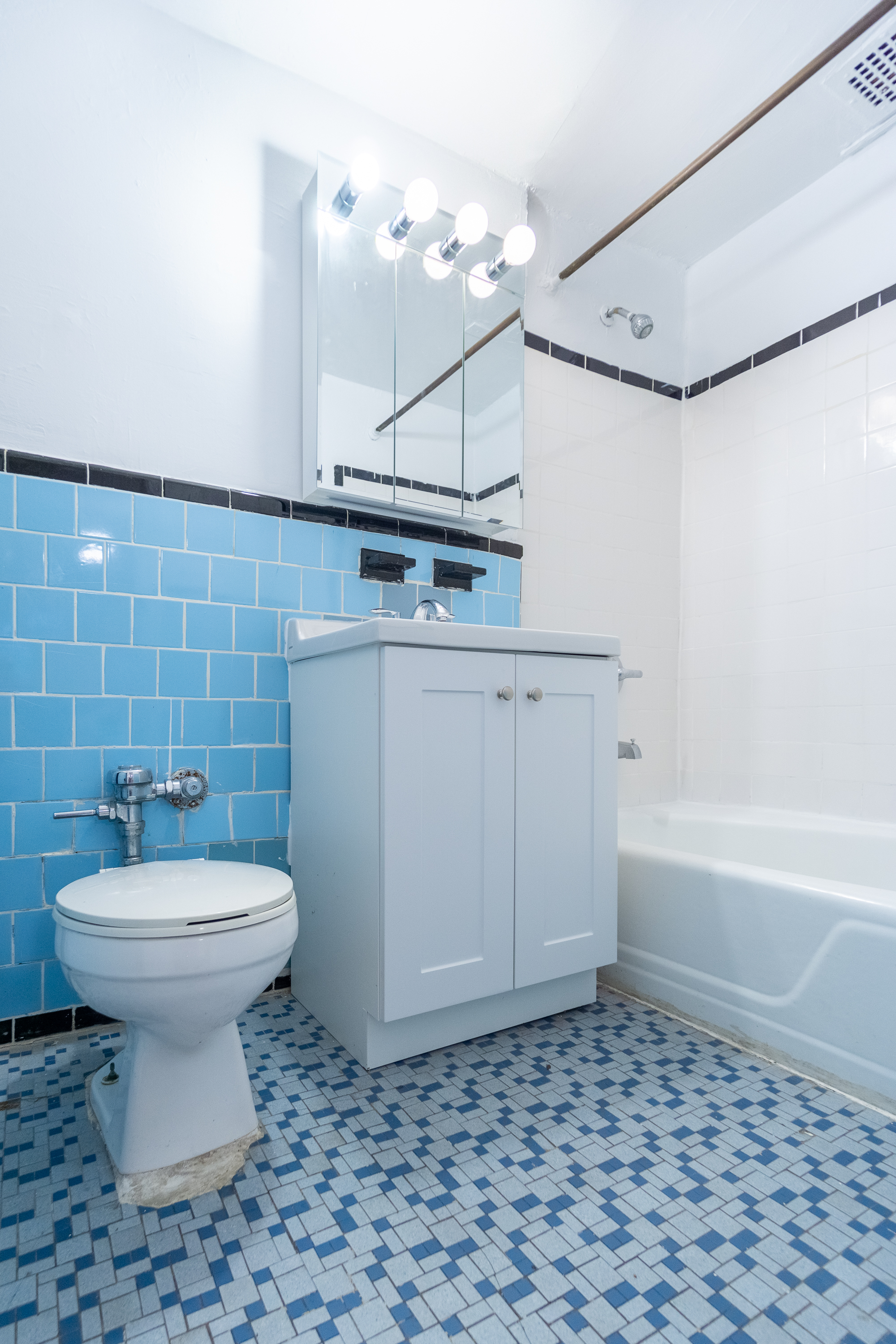 319 East 5th Street, Unit B Manhattan, NY 10003 - Photo 10 of 17 a bathroom with a sink a toilet and bathtub