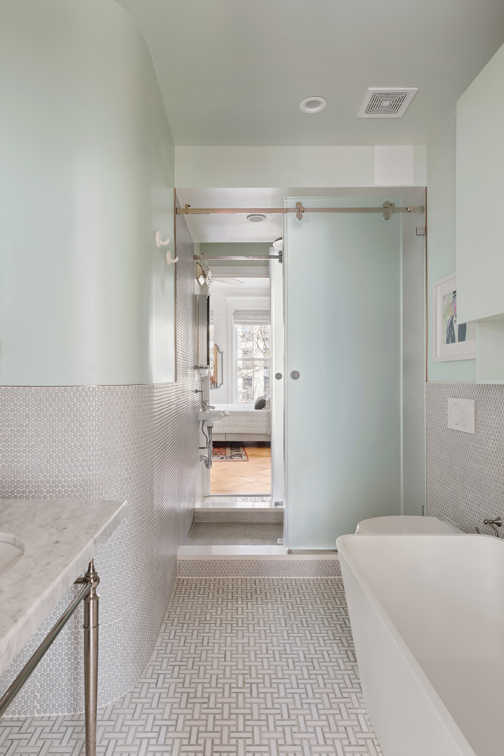 193 Sterling Place, Unit 2 Brooklyn, NY 11238 - Photo 12 of 15 a bathroom with a sink a toilet and shower