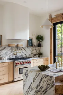 a kitchen with a stove and a sink