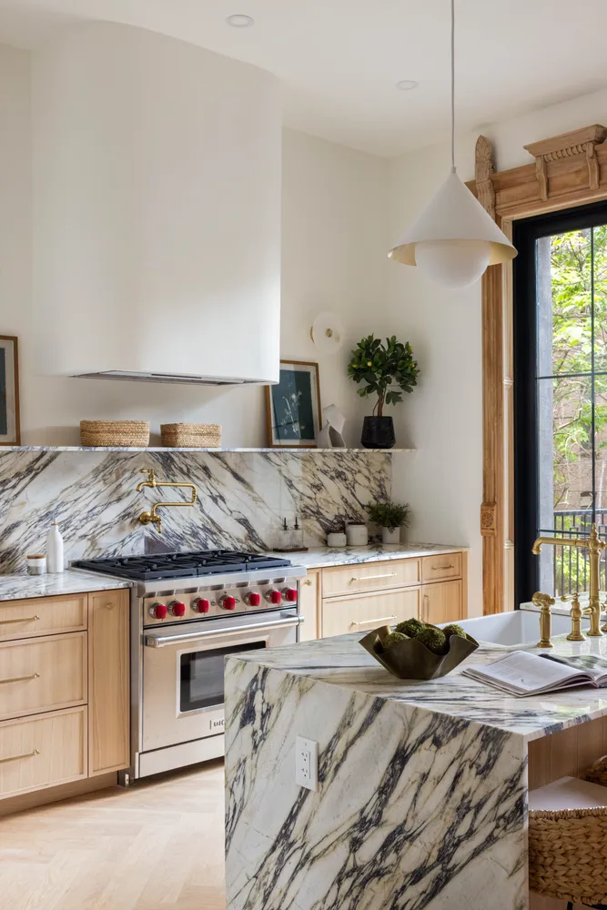 a kitchen with a stove and a sink
