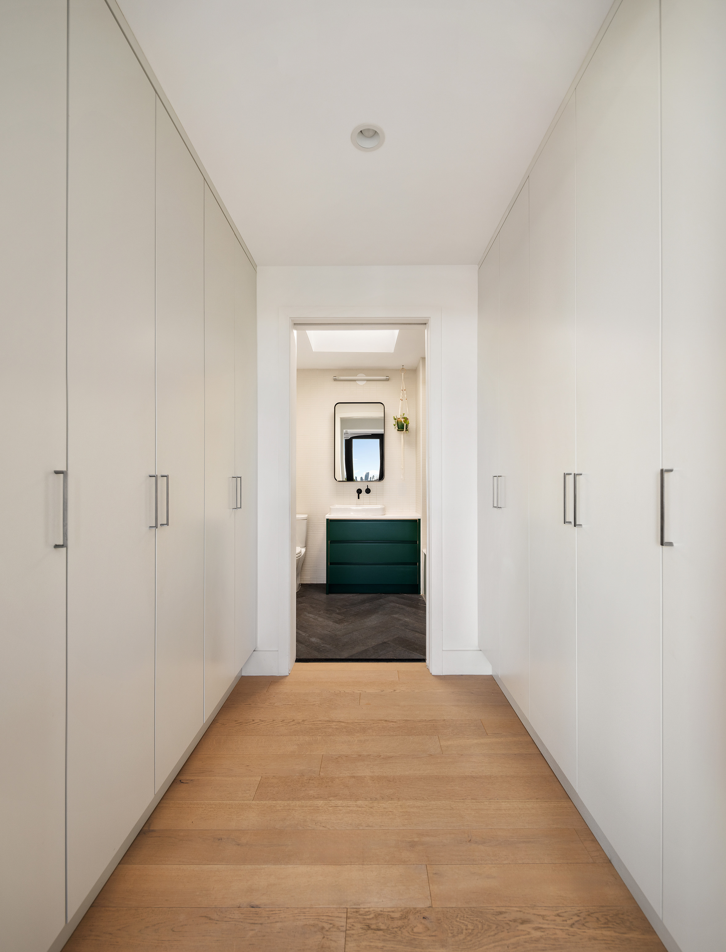 762 Park Place, Unit PH1 Brooklyn, NY 11216 - Photo 4 of 15 a view of a hallway with wooden floor and a living room
