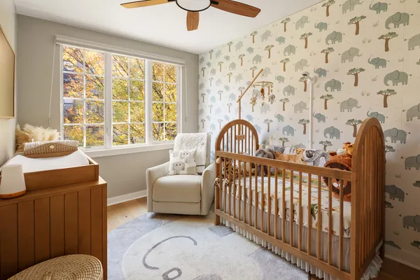a bedroom with furniture and a window