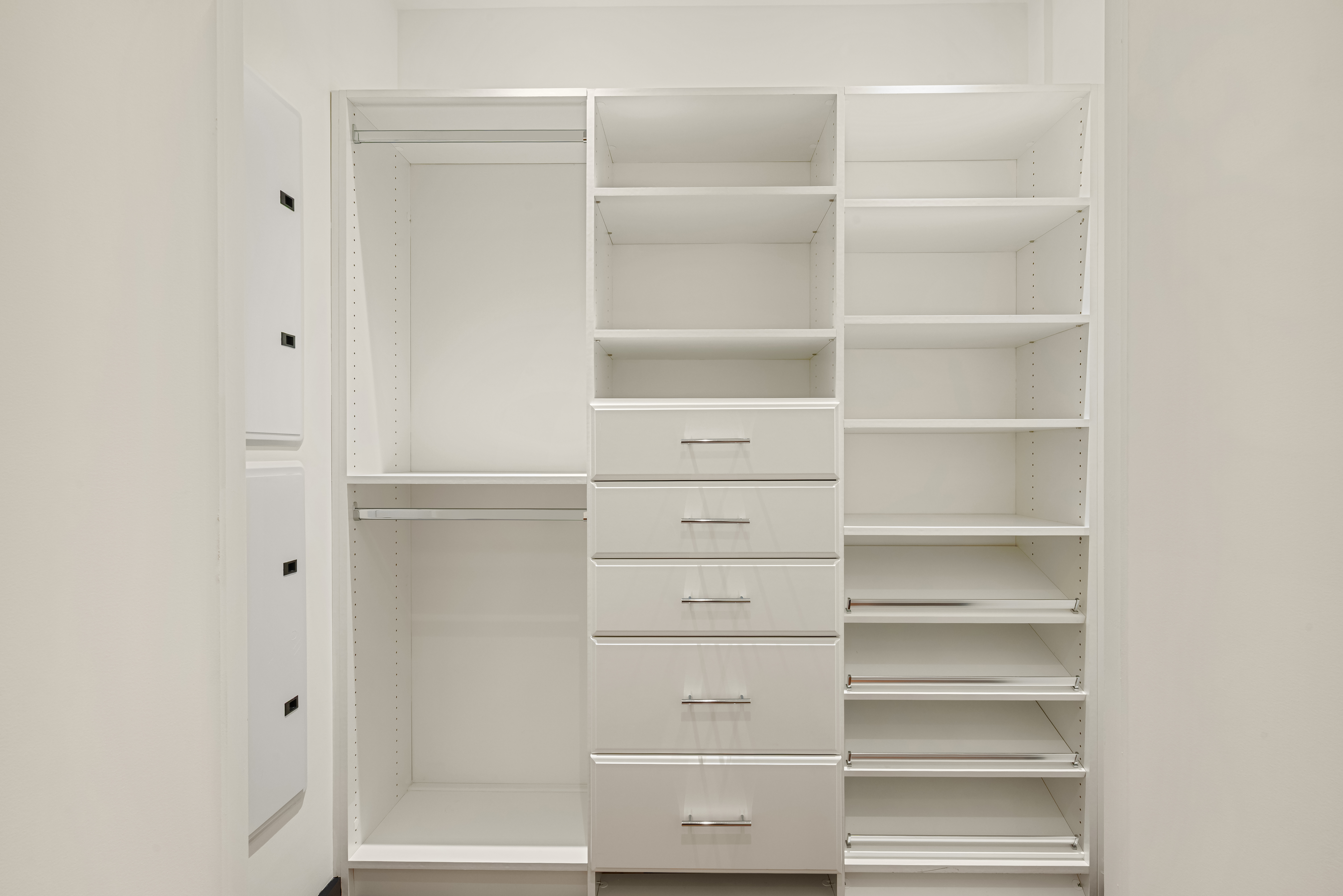 53 West 53rd Street, Unit 16C Manhattan, NY 10019 - Photo 11 of 12 a view of walk in closet with empty racks