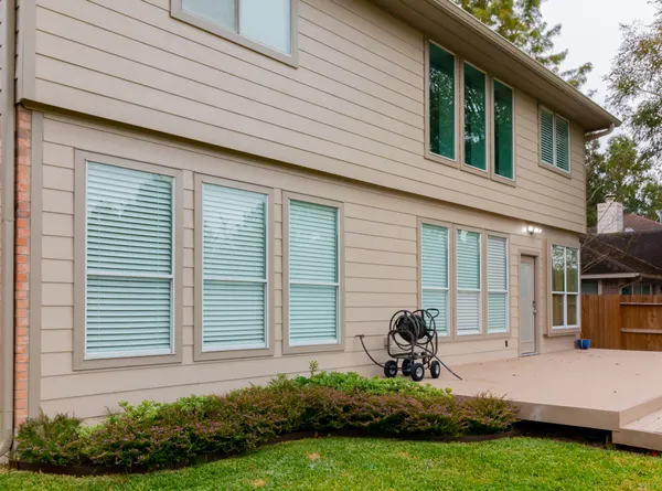 a house view with a garden space