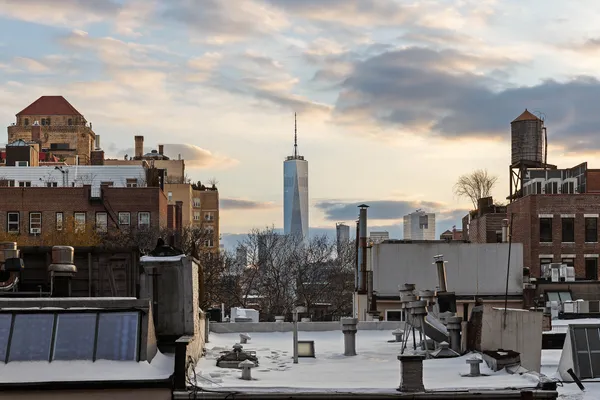 a view of a city with tall buildings