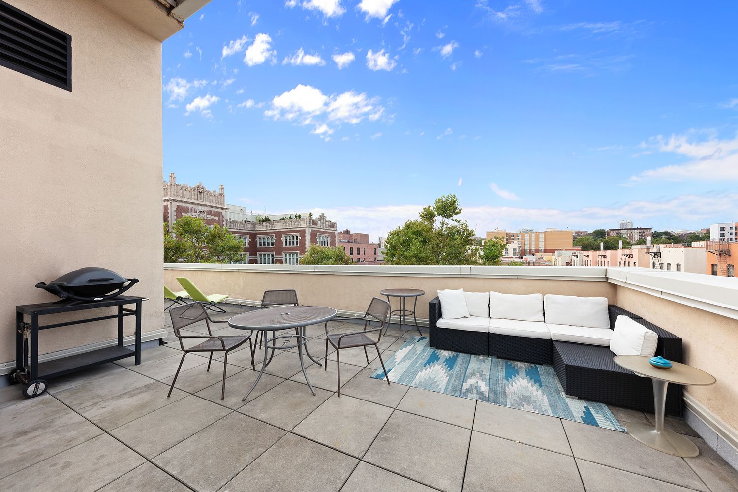 221 West 148th Street, Unit 4B Manhattan, NY 10039 - Photo 9 of 10 a view of a terrace with furniture and a terrace view