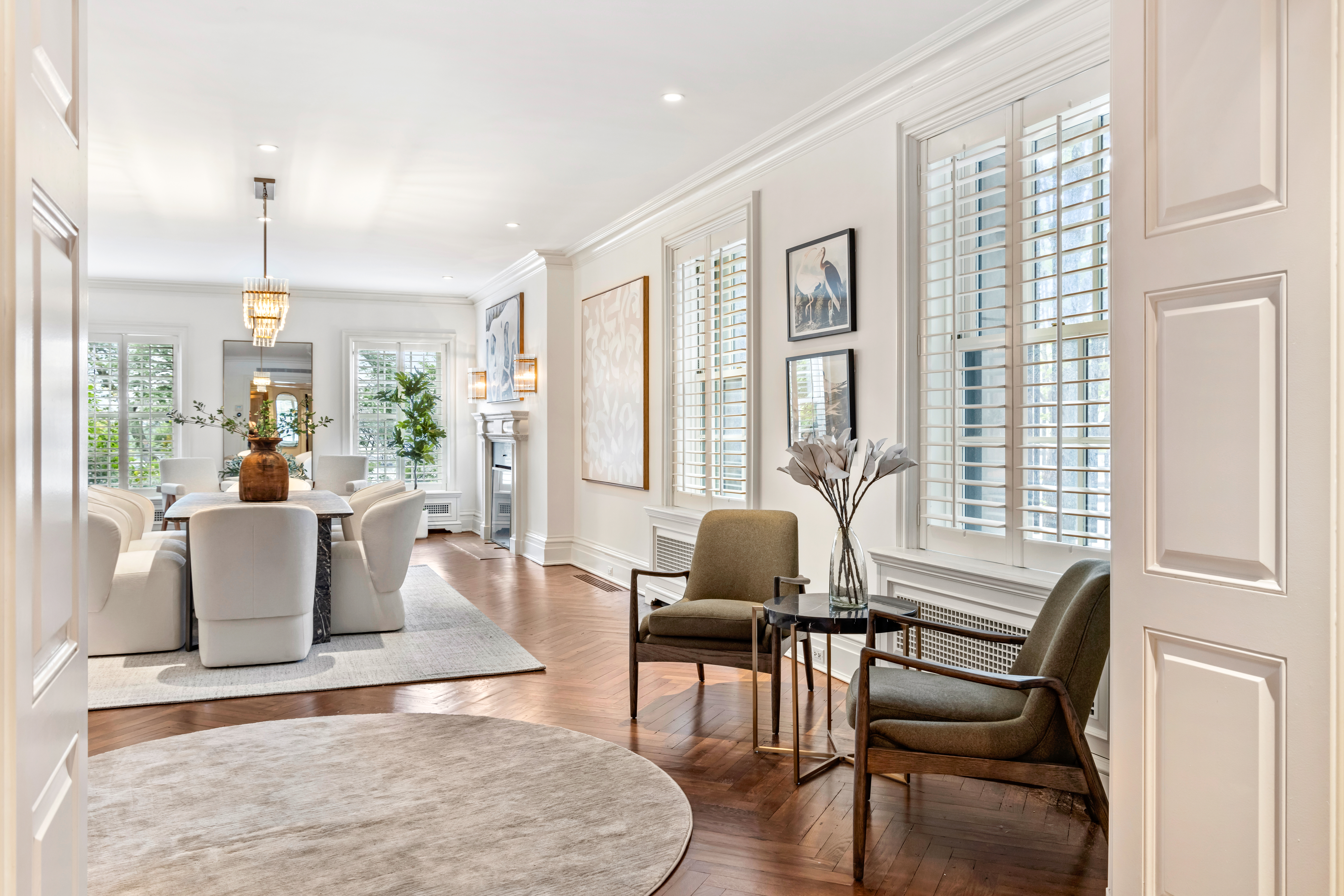 21 Beekman Place Manhattan, NY 10022 - Photo 6 of 16 a living room with furniture and a large window