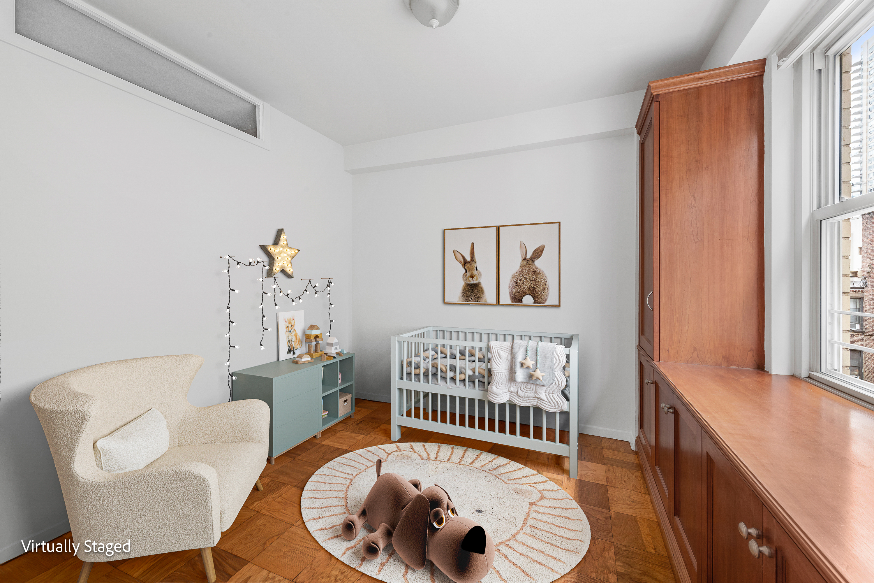 370 East 76th Street, Unit C607 Manhattan, NY 10021 - Photo 8 of 12 a bedroom with furniture and a window