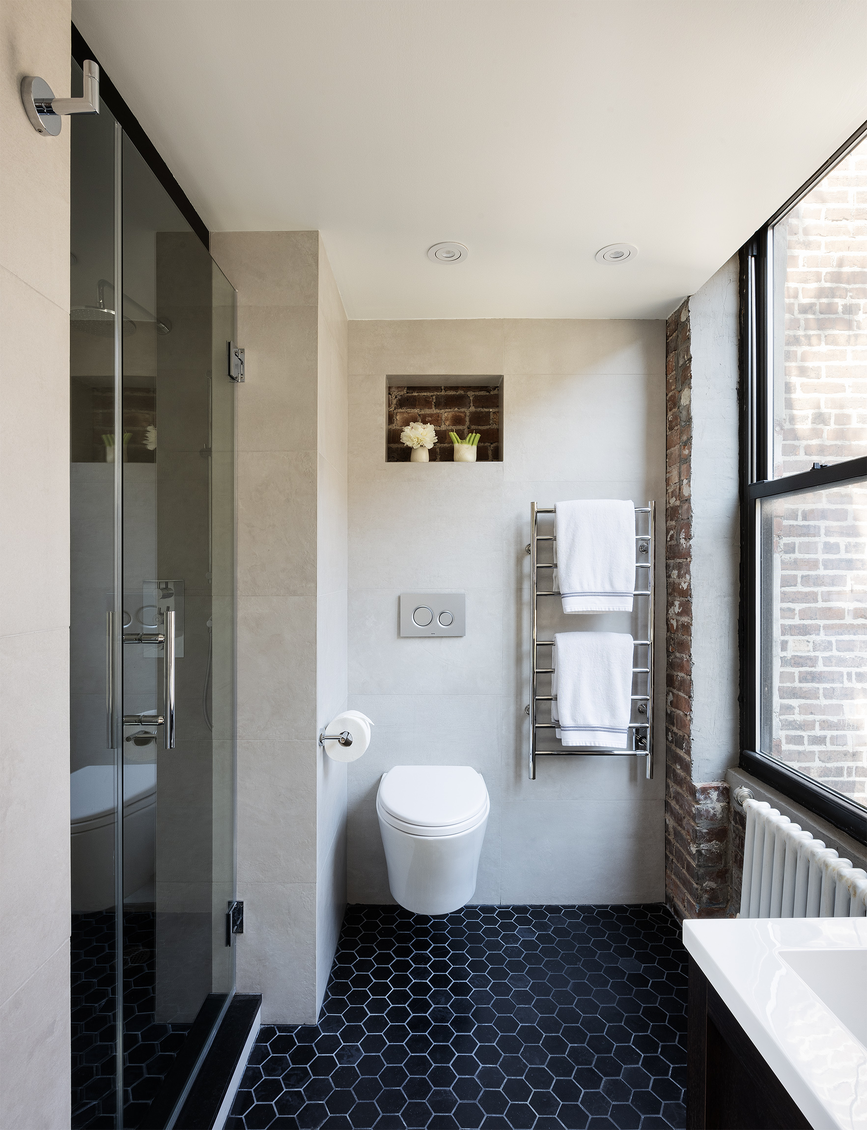184 Franklin Street, Unit 10 Manhattan, NY 10013 - Photo 6 of 8 a bathroom with a sink toilet and shower