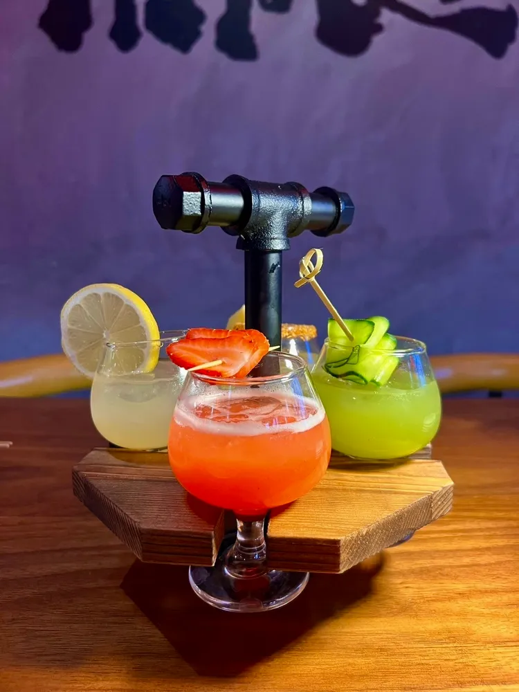 a swimming pool with some chairs