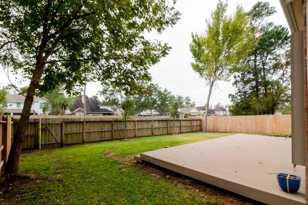 a view of a backyard with a small pool