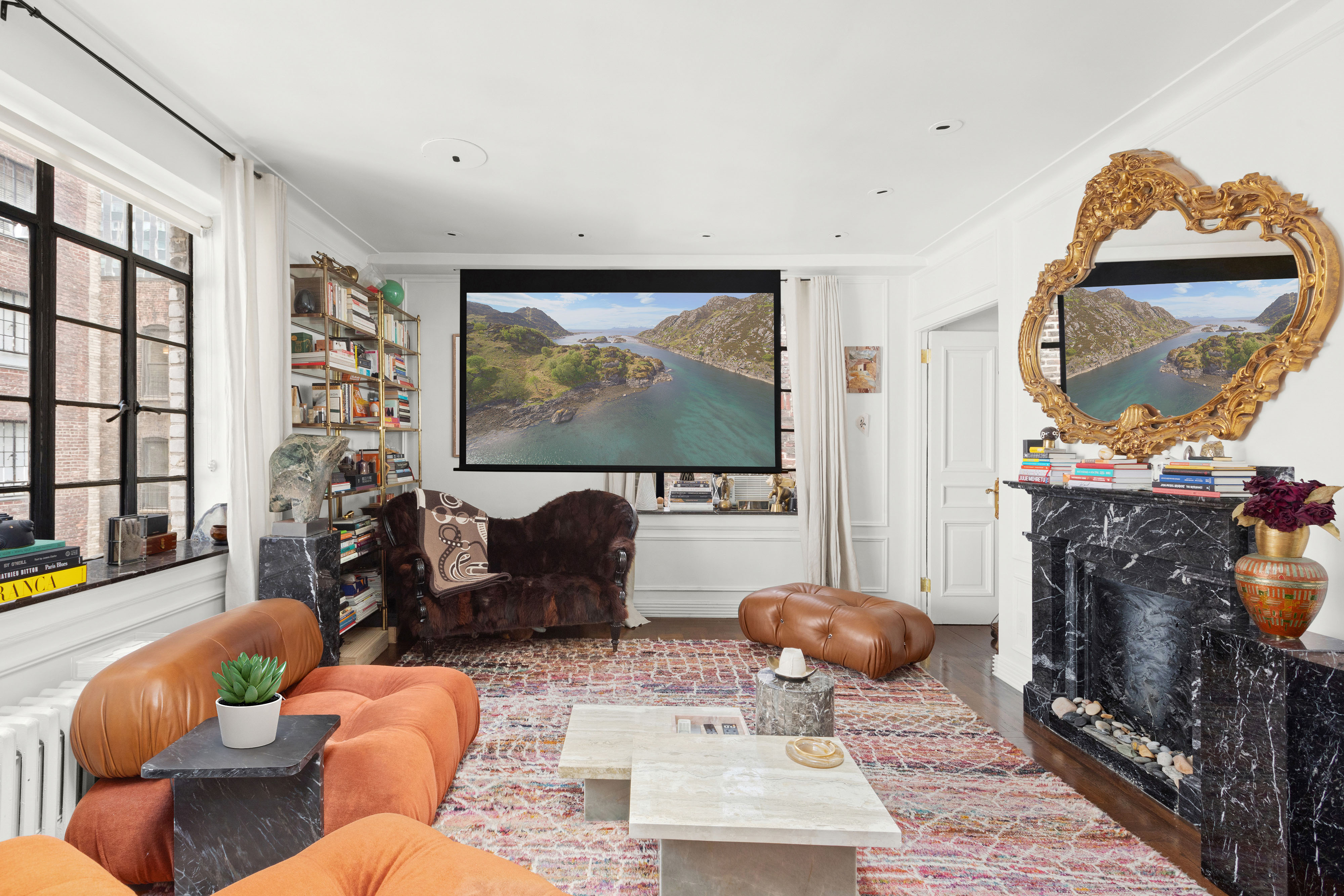 135 East 39th Street, Unit 6D Manhattan, NY 10016 - Photo 3 of 11 a living room with furniture and a flat screen tv