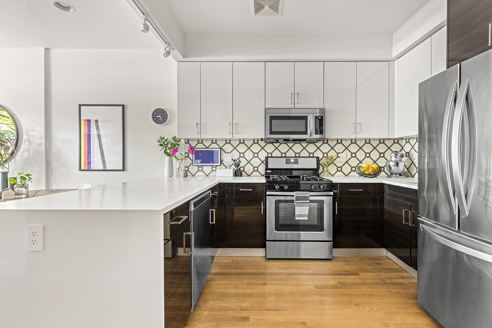 495 Rutland Road, Unit 1 Brooklyn, NY 11203 - Photo 3 of 13 a kitchen with stainless steel appliances granite countertop a sink stove and refrigerator
