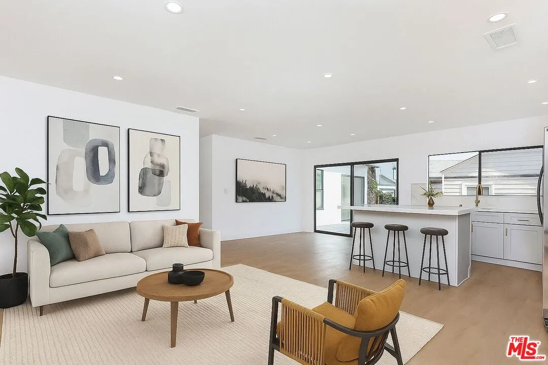 a kitchen with a stove sink and refrigerator