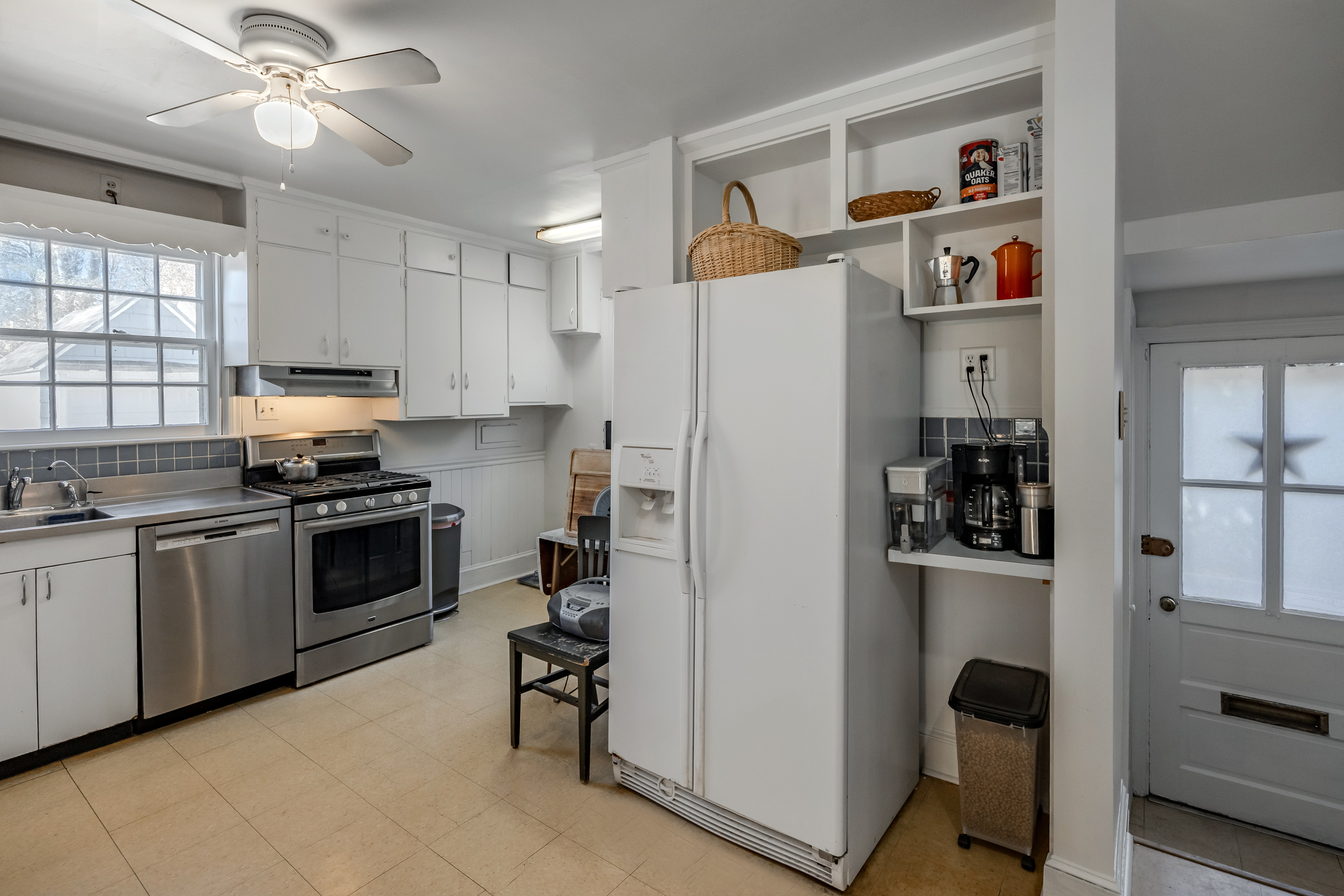 14 Decatur Road Havertown, PA 19083 - Photo 18 of 43 a kitchen with a refrigerator and a stove