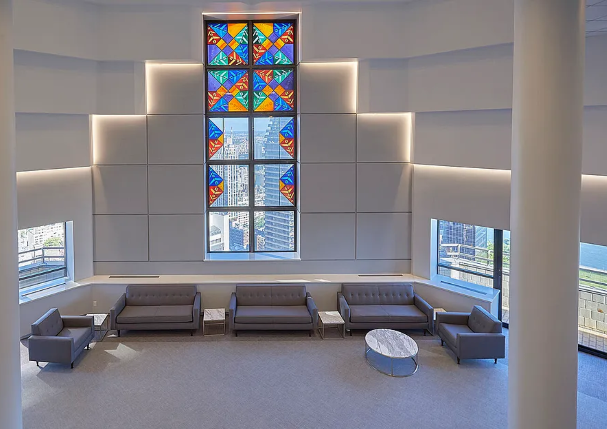 240 East 47th Street, Unit 4B Manhattan, NY 10017 - Photo 16 of 25 a living room with furniture and a window
