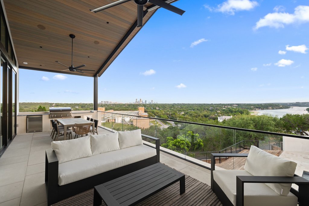 Mt Bonnell Road Austin, TX 78731 - Photo 33 of 51 a view of a roof deck with a couches and sky view