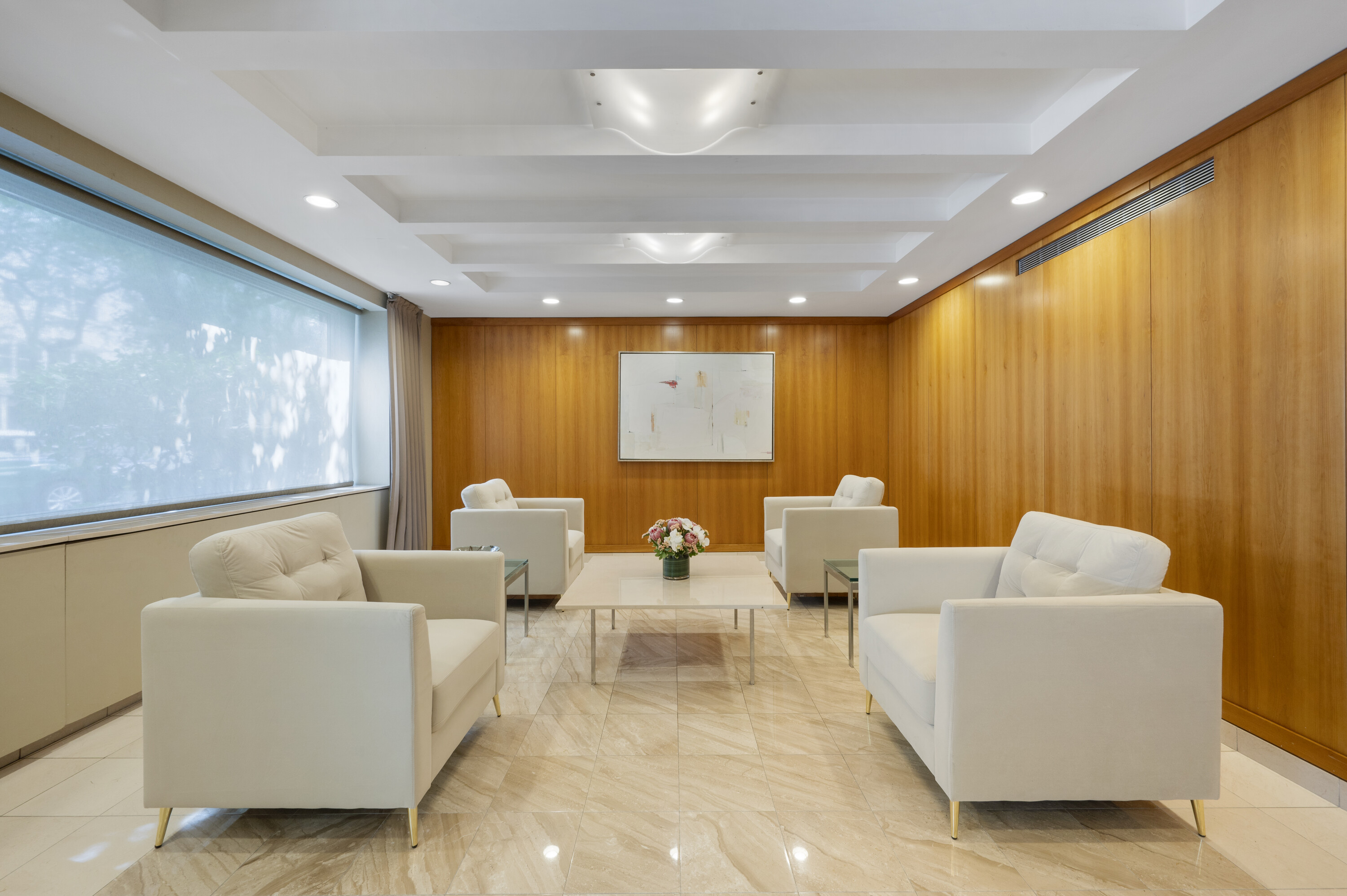 315 East 70th Street, Unit 7D Manhattan, NY 10021 - Photo 10 of 16 a living room with furniture and a large window