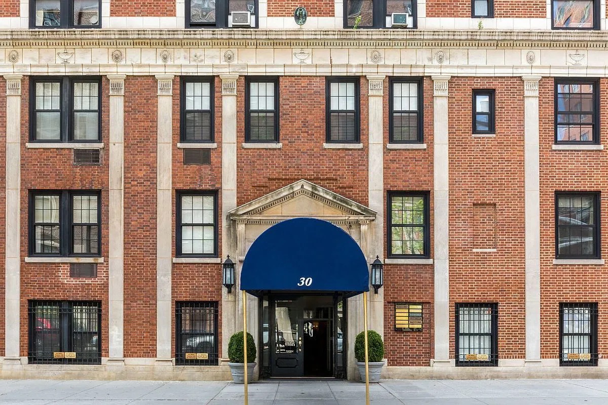 30 5th Avenue, Unit 4F Manhattan, NY 10011 - Photo 14 of 15 a front view of a building and a entrance
