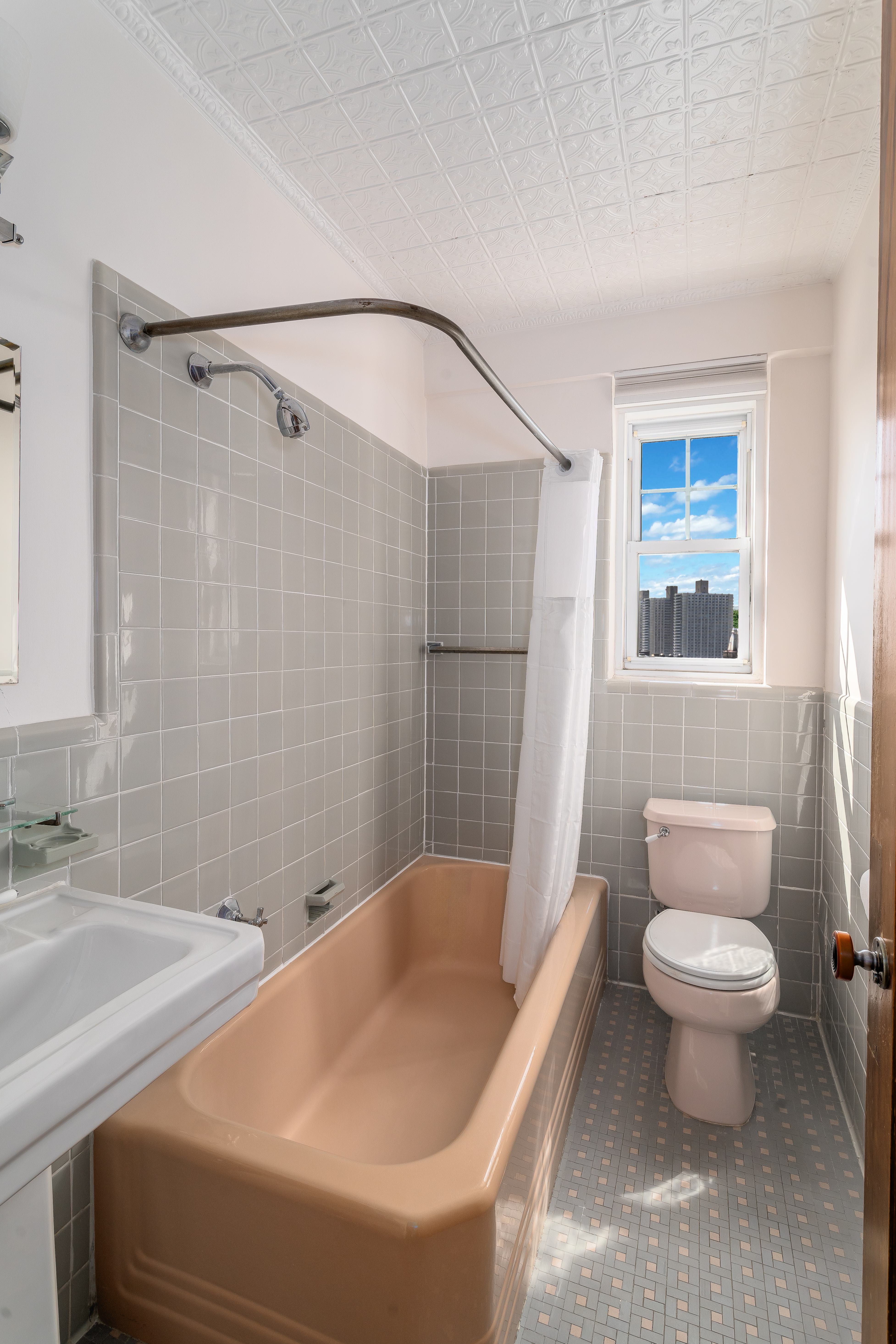 140 Cabrini Boulevard, Unit 136 Manhattan, NY 10033 - Photo 14 of 33 a bathroom with a sink toilet and shower