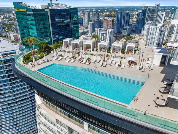 a view of a balcony with chairs