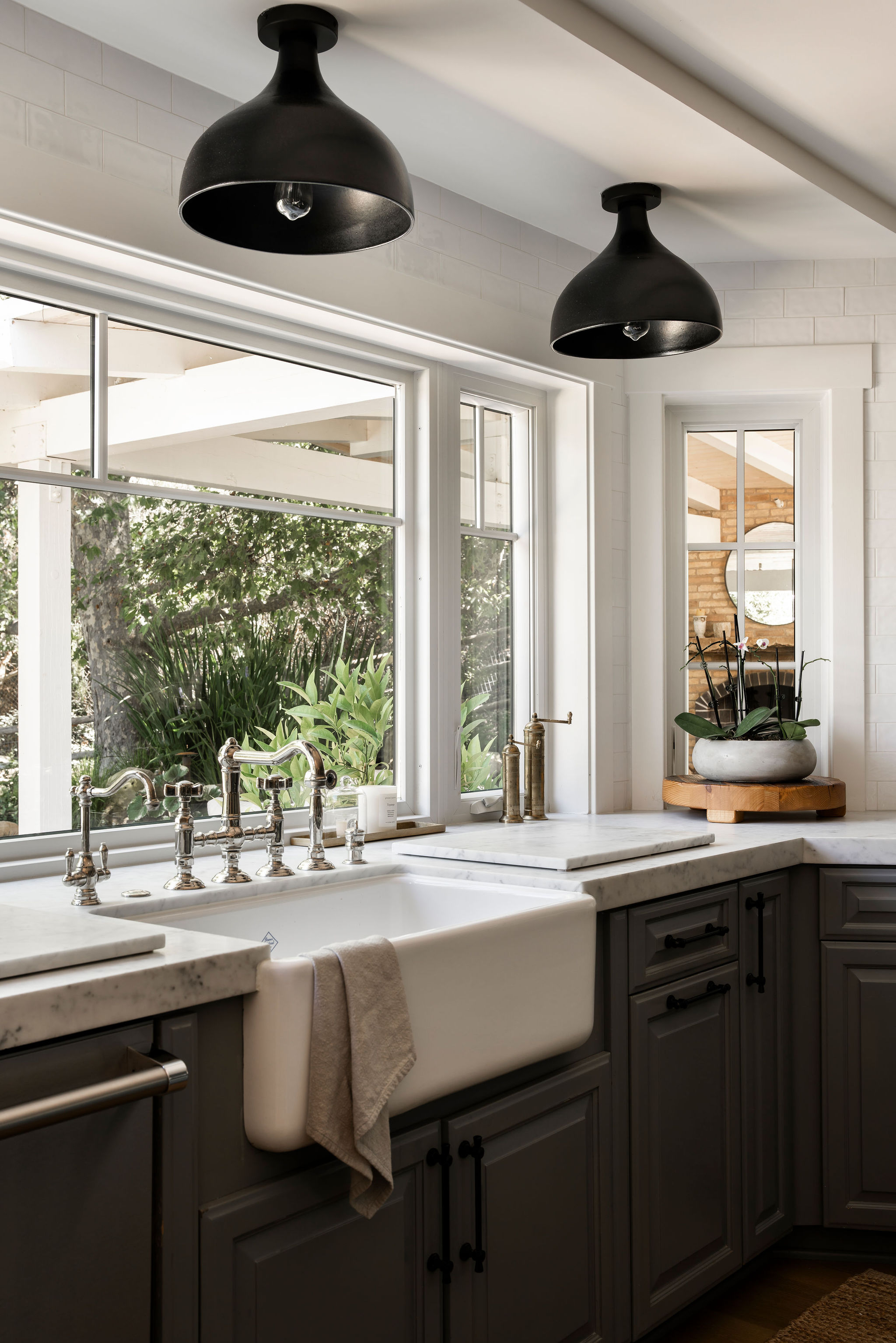 560 Cold Canyon Road Calabasas, CA 91302 - Photo 16 of 84 a kitchen with a sink and large window