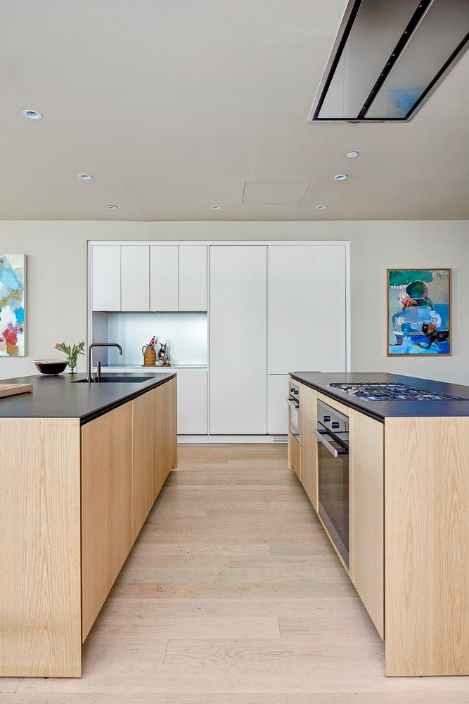 168 Plymouth Street, Unit PHC Brooklyn, NY 11201 - Photo 7 of 19 a large kitchen with stainless steel appliances granite countertop a stove a sink and a refrigerator