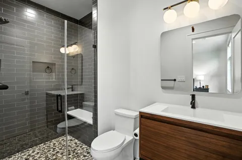 a view of a big yard with potted plants