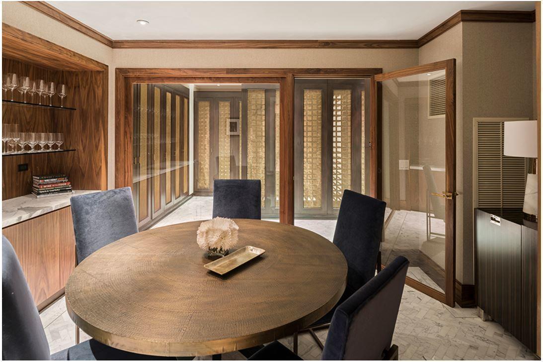 100 Barclay Street, Unit 13P Manhattan, NY 10007 - Photo 14 of 21 a view of a dining room with furniture window and wooden floor