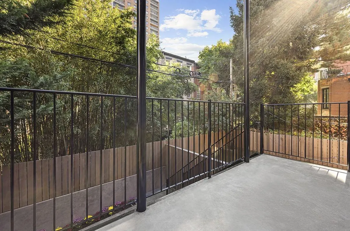 a bathroom with a sink toilet and mirror