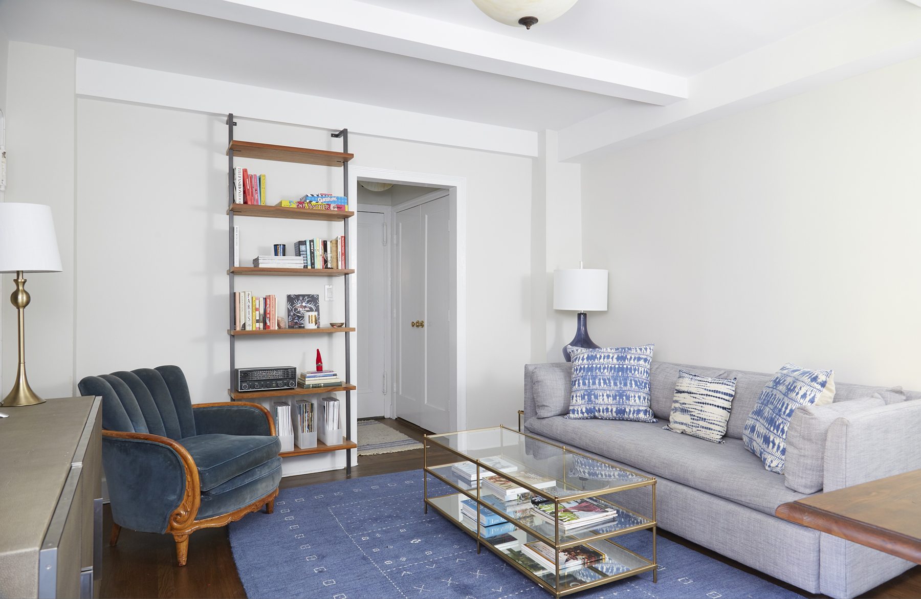 333 East 43rd Street, Unit 508 Manhattan, NY 10017 - Photo 3 of 8 a living room with furniture and a couch