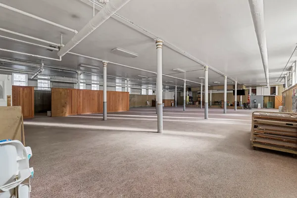 a room with furniture and lamp