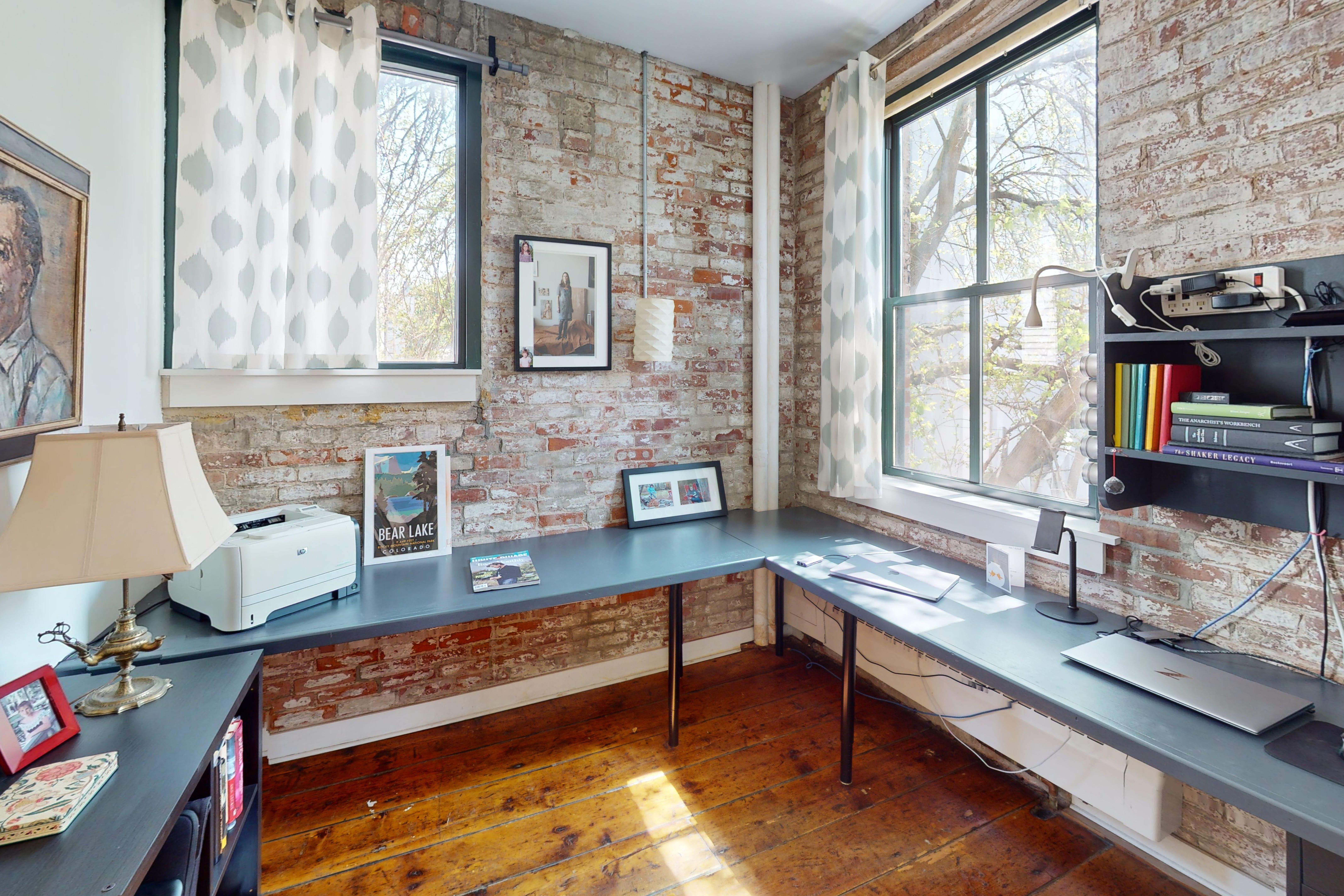 248 17th Street, Unit 6 Brooklyn, NY 11215 - Photo 13 of 21 a living room with furniture and large window with kitchen view