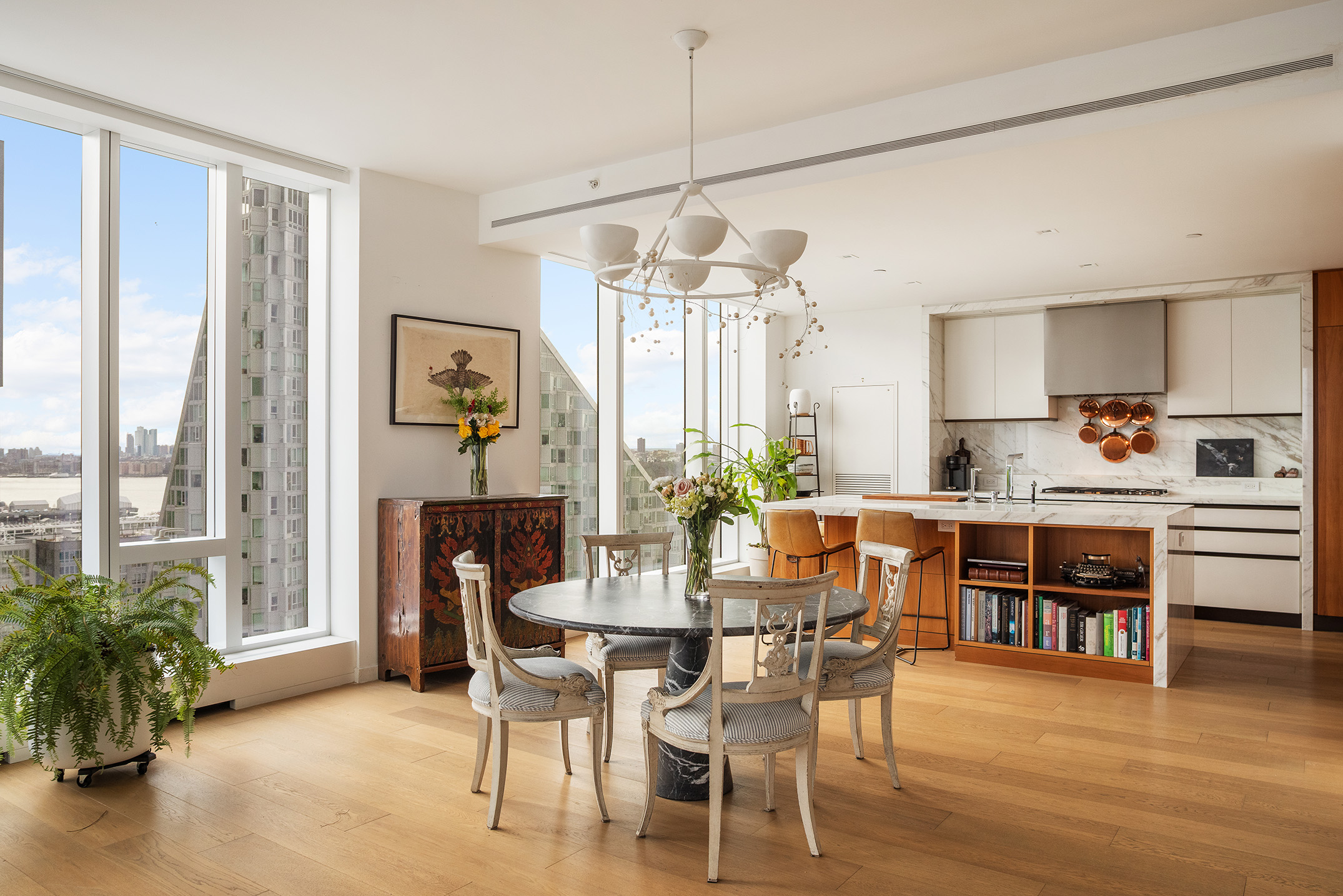 1 West End Avenue, Unit 22E Manhattan, NY 10023 - Photo 4 of 32 a dining room with furniture and window