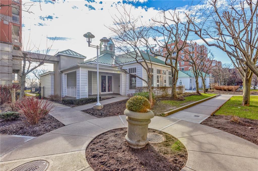 135 Oceana Drive East, Unit 2C Brooklyn, NY 11235 - Photo 18 of 29 a view of a house with a yard