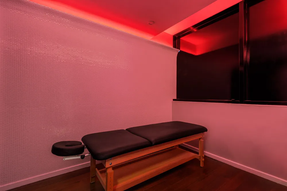 a backyard of a house with table and chair