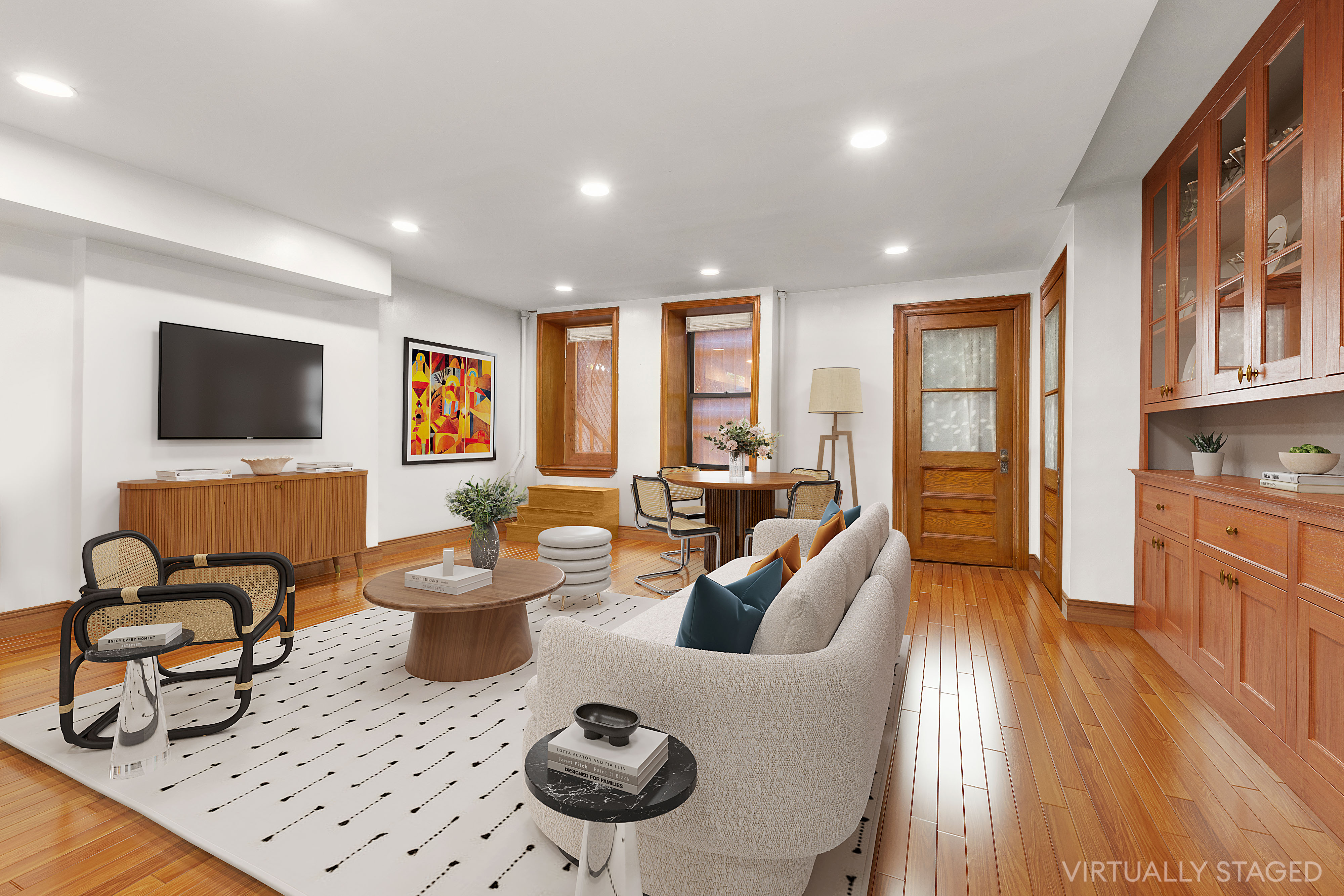 117 West 120th Street Manhattan, NY 10027 - Photo 26 of 31 a living room with furniture a flat screen tv and floor to ceiling window